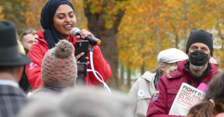 Protesters speaking about the impacts of climate change